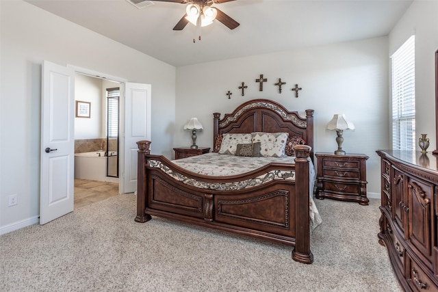3236 Camden Creek Rd, Krum, TX 76249 - bedroom featuring light colored carpet, ensuite bathroom, baseboards, and a ceiling fan