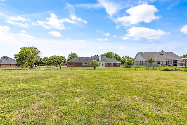view of yard with fence