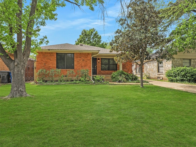 823 Cliffdale Ave, Dallas, TX 75211 - ranch-style house with concrete driveway, brick siding, and a front yard
