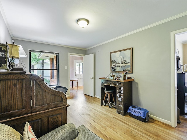 823 Cliffdale Ave, Dallas, TX 75211 - living area with wood finished floors, crown molding, and baseboards