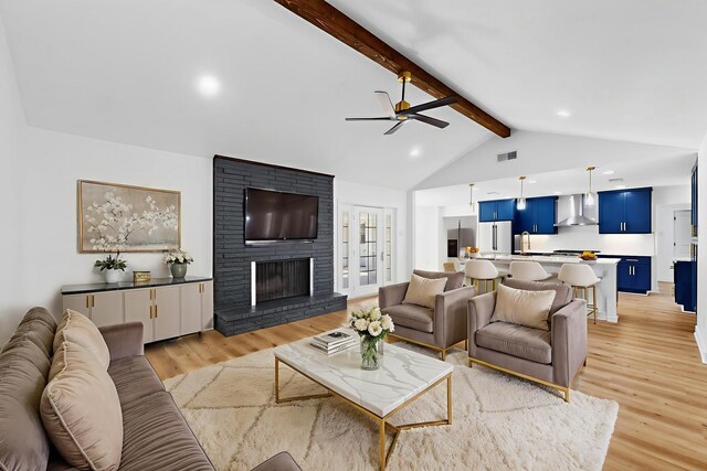 7116 Town Bluff Dr, Dallas, TX 75248 - living room with ceiling fan, light wood finished floors, a fireplace, and recessed lighting