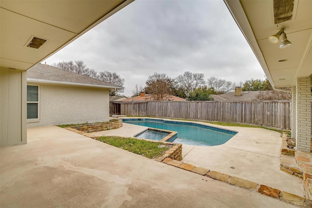 7116 Town Bluff Dr, Dallas, TX 75248 - view of pool featuring a patio area, a fenced backyard, and a pool with connected hot tub
