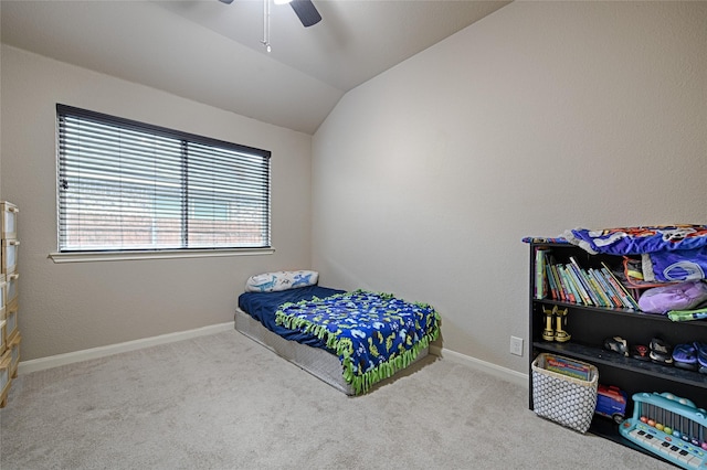 bedroom with lofted ceiling, baseboards, carpet floors, and ceiling fan