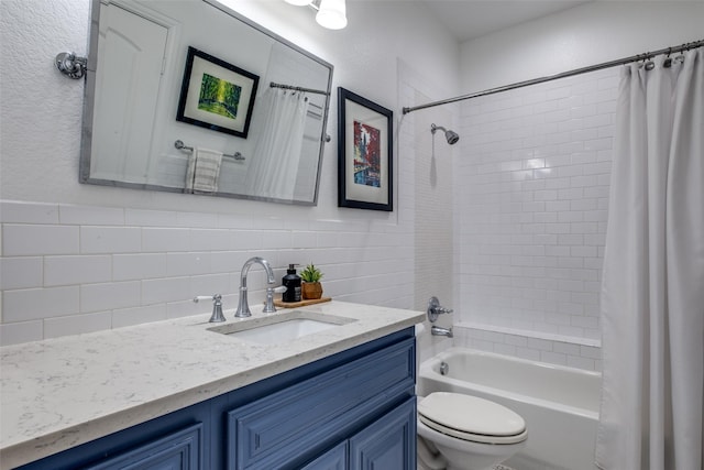 full bath featuring decorative backsplash, shower / bath combination with curtain, vanity, and toilet