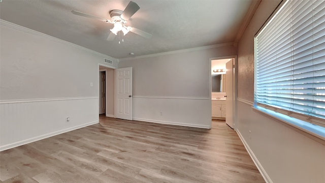 1814 Novel Dr, Garland, TX 75040 - unfurnished bedroom with light wood-type flooring, ensuite bathroom, visible vents, a ceiling fan, and crown molding
