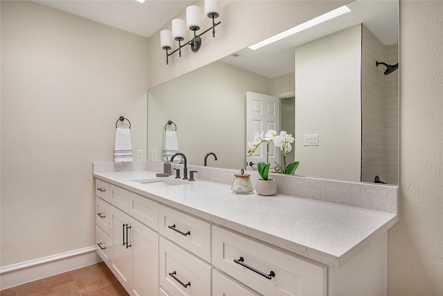 9603 Greensprint Dr, Dallas, TX 75238 - full bath with vanity and tile patterned flooring