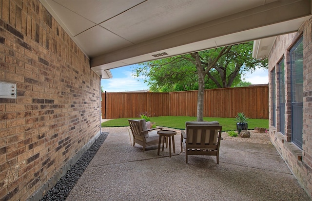 9603 Greensprint Dr, Dallas, TX 75238 - fenced backyard with a patio