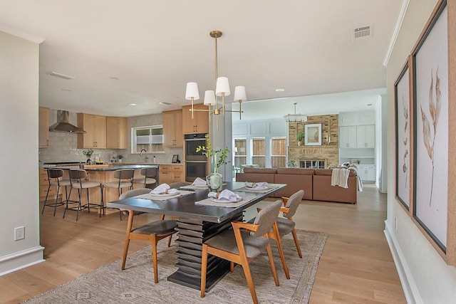 9603 Greensprint Dr, Dallas, TX 75238 - dining space with light wood-style flooring and recessed lighting