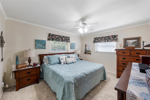 bedroom with ceiling fan, light carpet, crown molding, and baseboards
