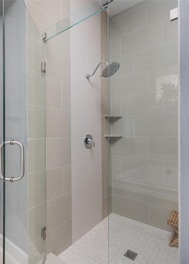 bathroom with a stall shower