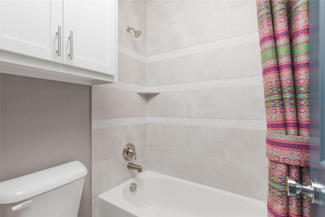full bath with shower / tub combo and toilet