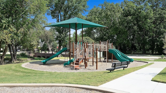 community playground featuring a yard