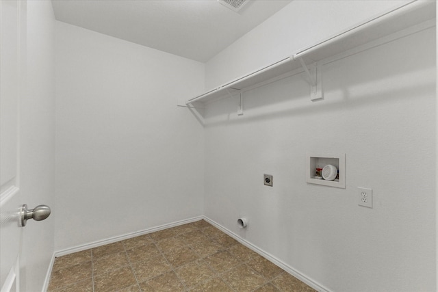 clothes washing area featuring hookup for a washing machine, baseboards, electric dryer hookup, and laundry area