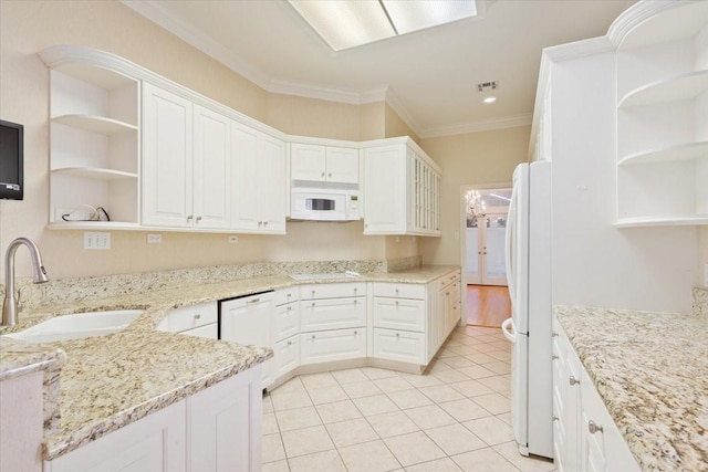 kitchen featuring open shelves, white appliances, a sink, and ornamental molding