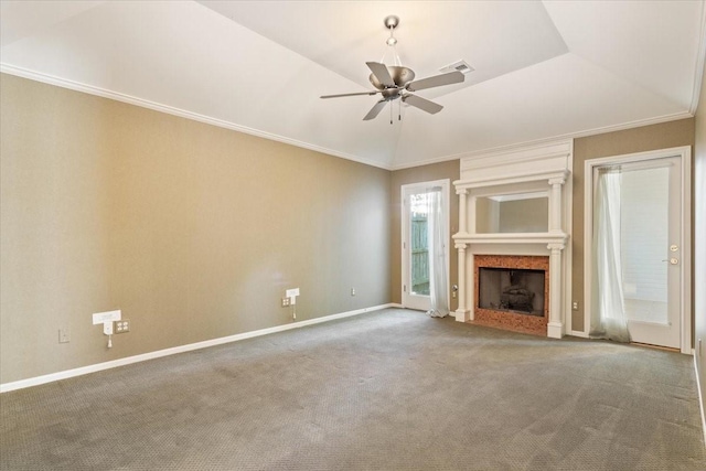 unfurnished living room featuring baseboards, visible vents, a ceiling fan, a fireplace, and carpet floors