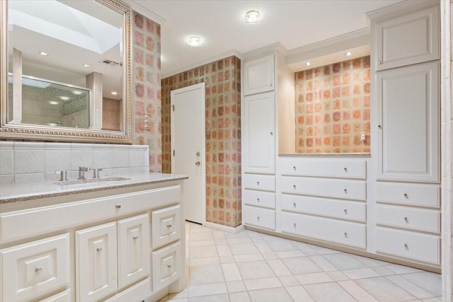 full bathroom featuring wallpapered walls, a shower stall, tile patterned flooring, visible vents, and vanity