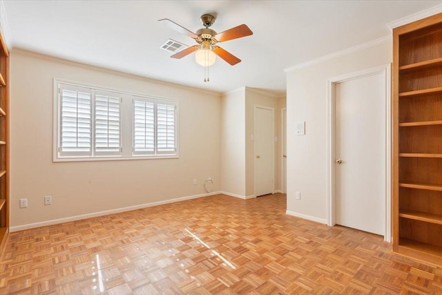 unfurnished bedroom with baseboards, ornamental molding, and visible vents