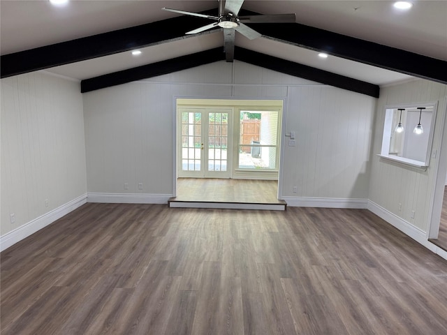 unfurnished living room featuring baseboards, wood finished floors, a ceiling fan, and baseboard heating