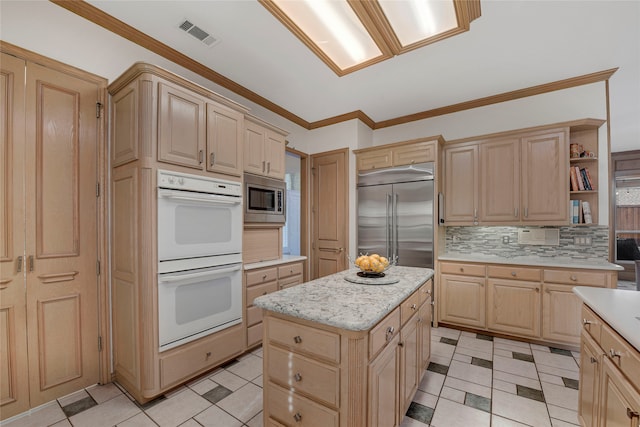 4524 Tuscany Dr, Plano, TX 75093 - kitchen featuring built in appliances, light brown cabinetry, decorative backsplash, light tile patterned flooring, and a kitchen island