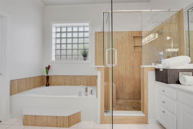 4524 Tuscany Dr, Plano, TX 75093 - bathroom featuring a garden tub, a stall shower, tile patterned flooring, vanity, and ornamental molding