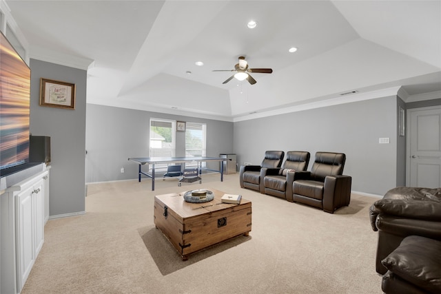 4524 Tuscany Dr, Plano, TX 75093 - living room with light carpet, a raised ceiling, ceiling fan, crown molding, and recessed lighting