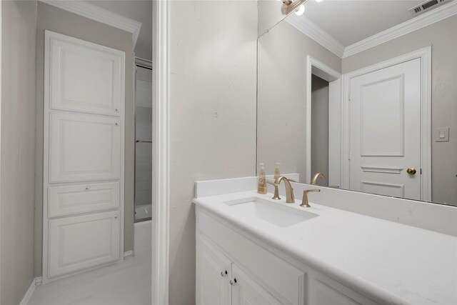 4524 Tuscany Dr, Plano, TX 75093 - bathroom featuring vanity, ornamental molding, and baseboards