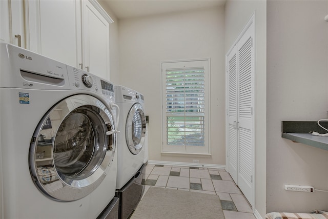 4524 Tuscany Dr, Plano, TX 75093 - laundry room with washer and clothes dryer, cabinet space, baseboards, and light tile patterned flooring