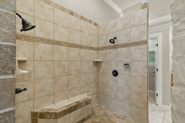 full bath featuring tiled shower and crown molding