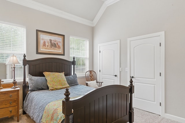 bedroom with lofted ceiling, ornamental molding, carpet flooring, and baseboards