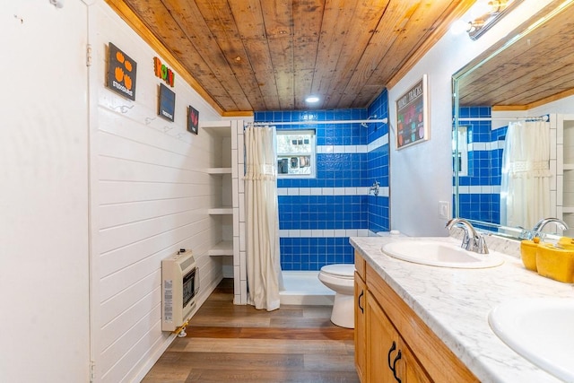 full bathroom with wood finished floors, heating unit, a sink, wooden ceiling, and toilet