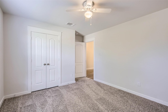 5019 Flanagan Dr, Forney, TX 75126 - unfurnished bedroom with carpet floors, baseboards, a closet, and ceiling fan
