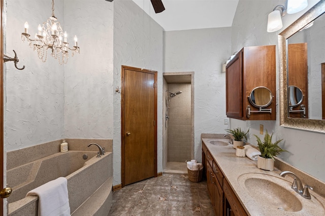 full bath with a tile shower, double vanity, a sink, and a bath