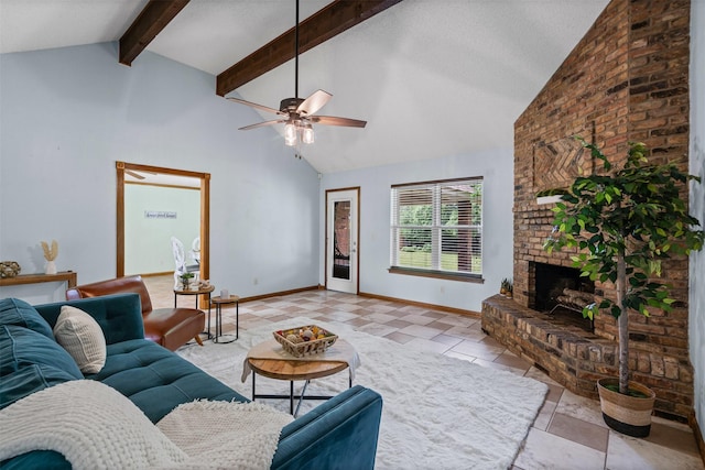 living room featuring beamed ceiling, a fireplace, high vaulted ceiling, a ceiling fan, and baseboards