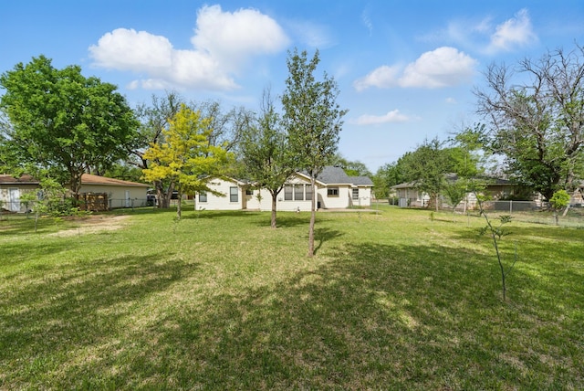 view of yard featuring fence