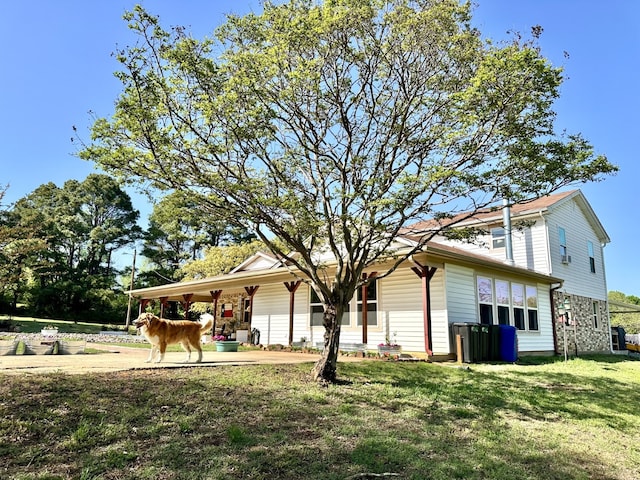 exterior space featuring a yard