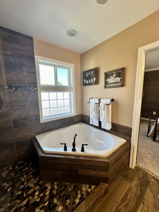 full bath featuring a bath