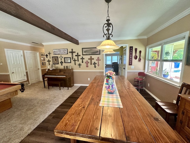 dining space with crown molding, plenty of natural light, beamed ceiling, and dark wood-style floors