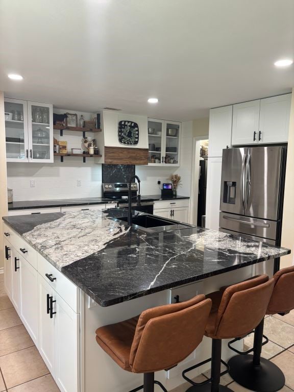 450 Vz County Road 4814, Ben Wheeler, TX 75754 - kitchen featuring open shelves, stainless steel fridge, recessed lighting, and light tile patterned floors
