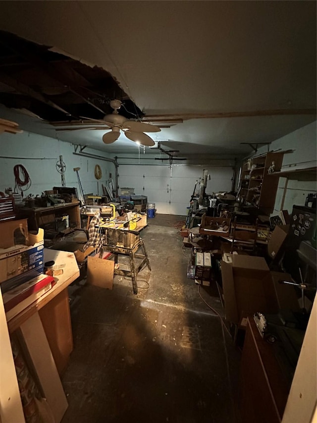 misc room with concrete floors and a workshop area