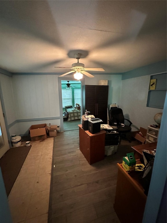 office featuring wood finished floors and a ceiling fan