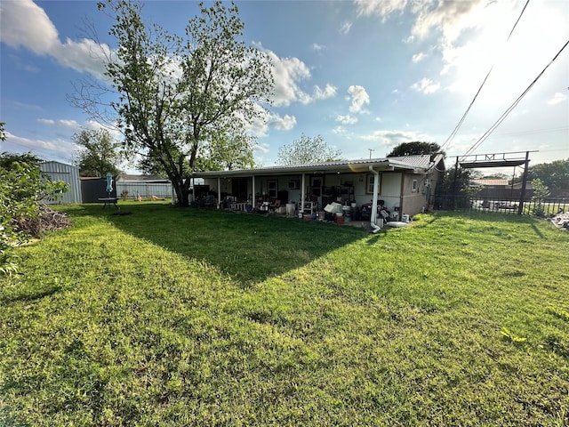 view of yard with fence