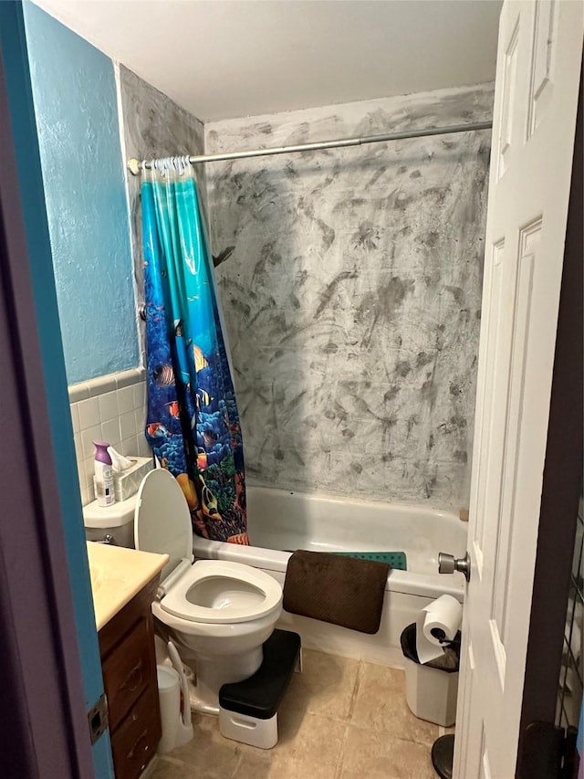 bathroom featuring shower / bath combo, toilet, tile patterned flooring, and vanity