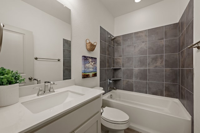 full bath featuring toilet, vanity, and washtub / shower combination