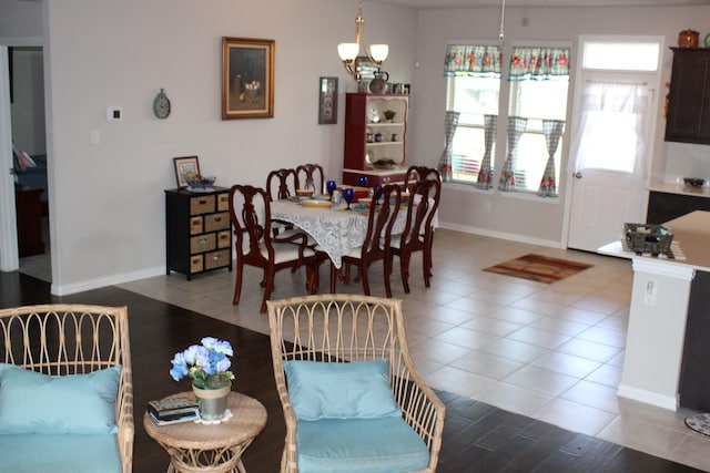 2267 County Road 4010, Decatur, TX 76234 - dining room featuring baseboards, a chandelier, and tile patterned flooring