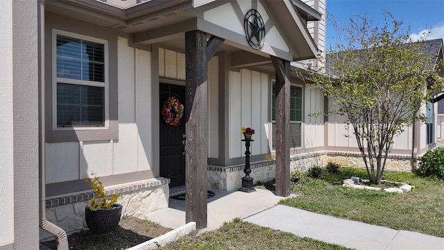 2267 County Road 4010, Decatur, TX 76234 - view of exterior entry featuring board and batten siding