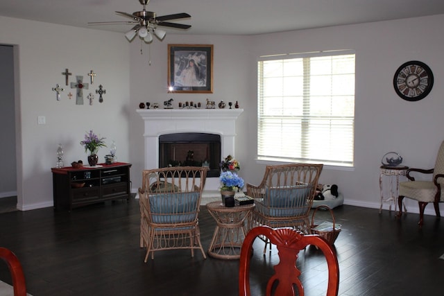 2267 County Road 4010, Decatur, TX 76234 - living area featuring ceiling fan, plenty of natural light, wood finished floors, and a fireplace