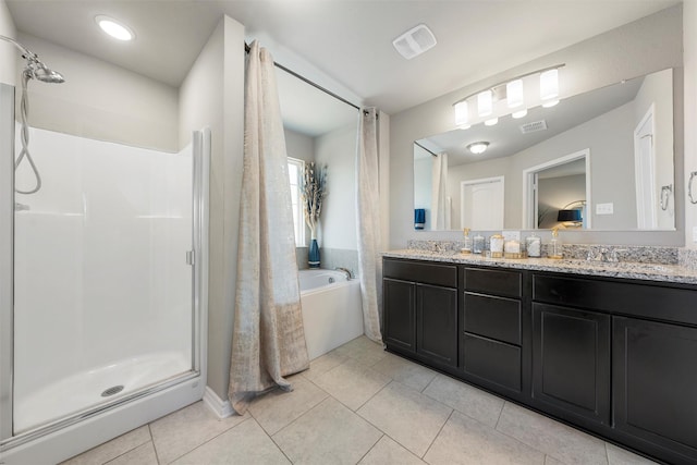 full bath with double vanity, a sink, visible vents, and a stall shower