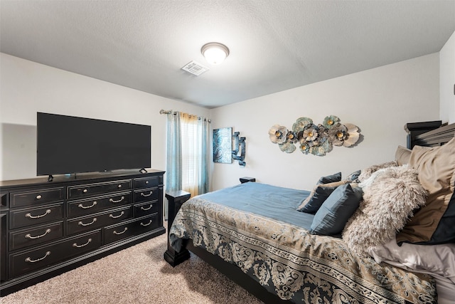 bedroom featuring visible vents and carpet