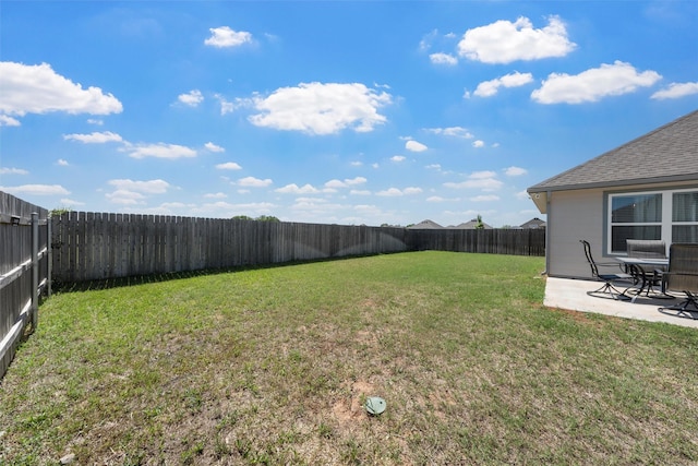 view of yard featuring a fenced backyard and a patio area