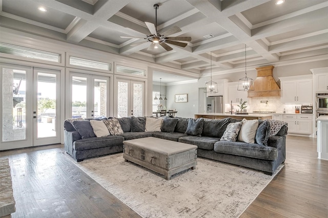 2161 Eagles Ridge Dr, Weatherford, TX 76087 - living area featuring ceiling fan, beamed ceiling, french doors, and wood finished floors